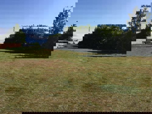 Et billede af Trykkeriparken, der viser parkens udvikling over tid.