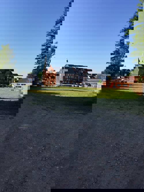 Et billede af Trykkeriparken, der viser parkens udvikling over tid.