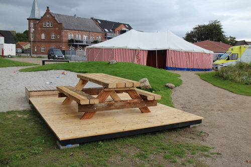 Et billede af Trykkeriparken, der viser parkens udvikling over tid.