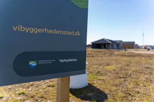 Billede med teksten, Vi Bygger Hedensted.